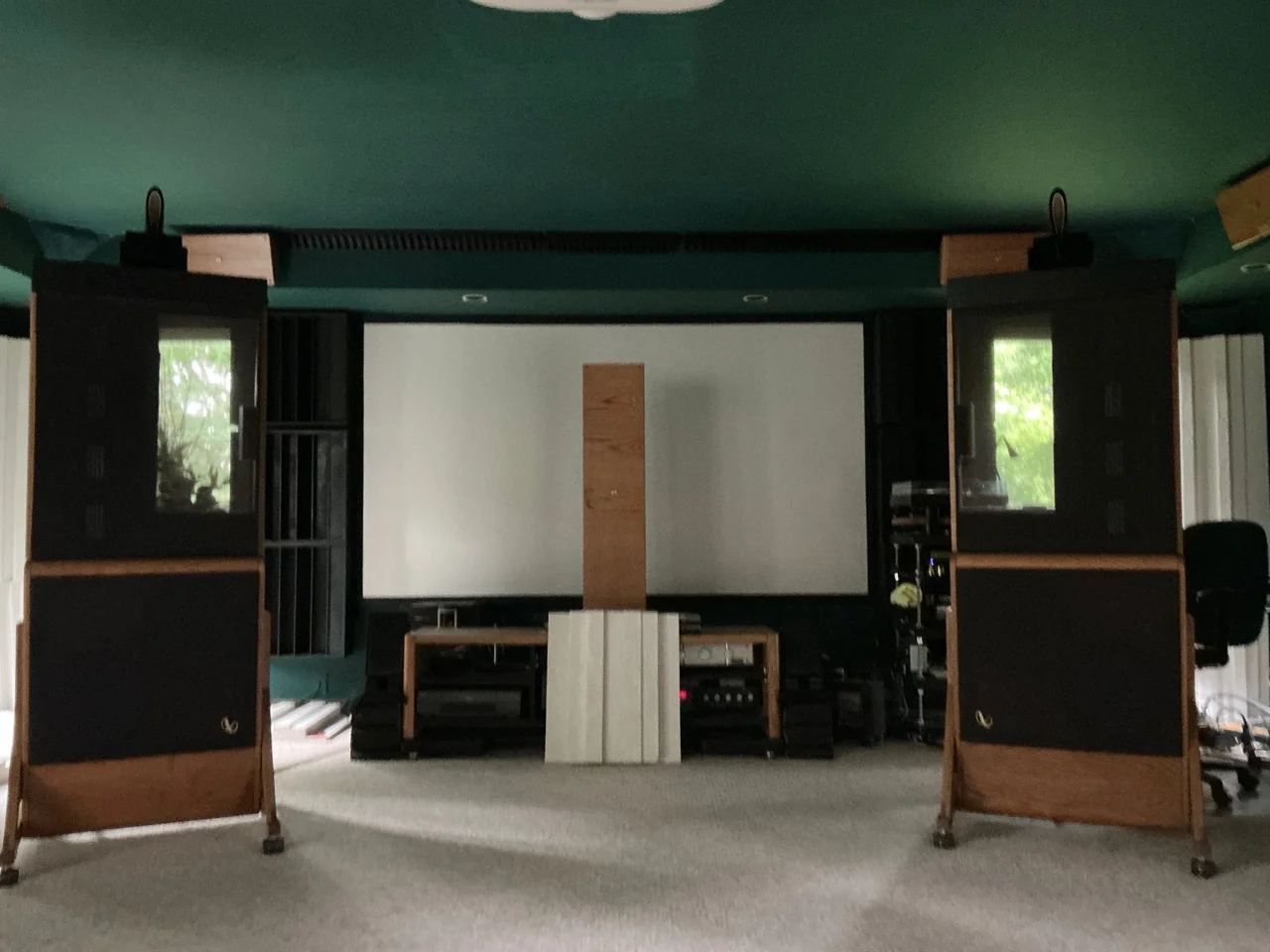 MADO™ handcrafted open baffle speakers in home theater listening room with projection screen